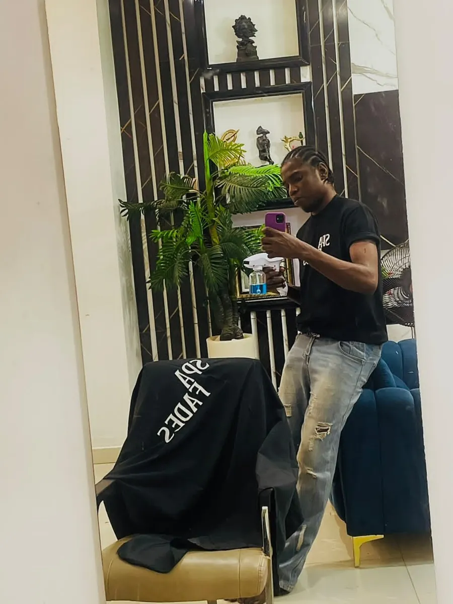 I.W.F. Ugwu, Master Pro Mobile Barber and face of SPA_Fades, preparing for an appointment