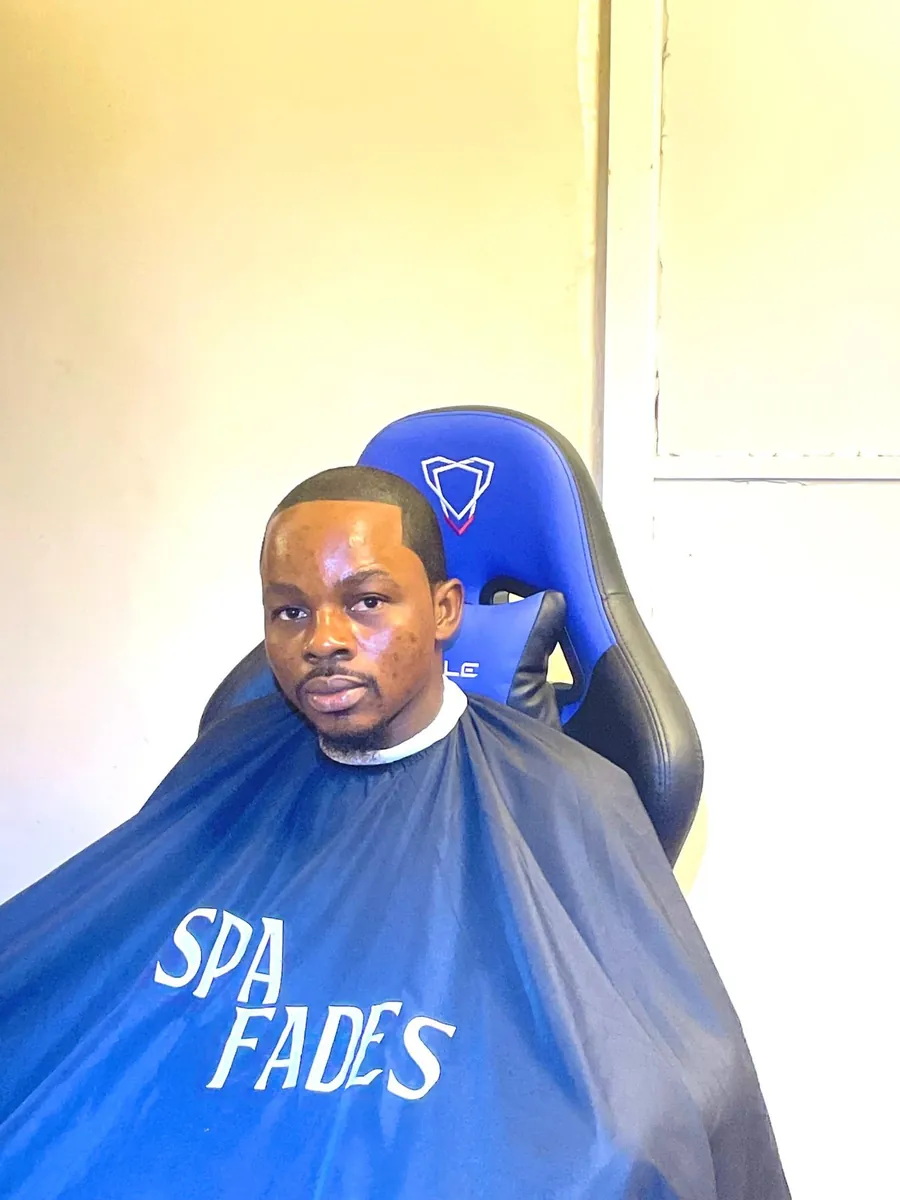 SPA_Fades mobile barber restoring natural hair color and shape for a returning client in Ebonyi State